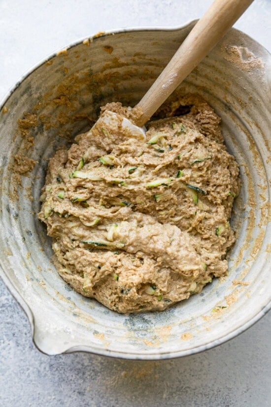 Slowly stir the flour mixture into the wet ingredients.