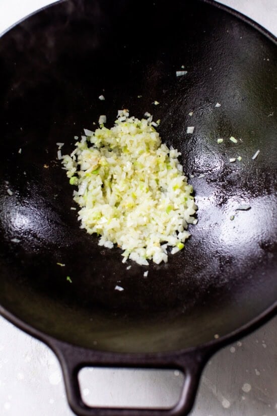 Add veggies to wok