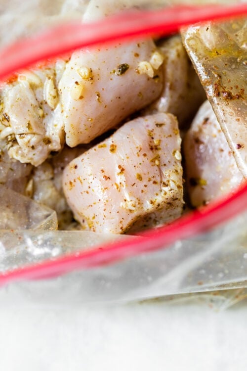 raw marinated chicken in a bag