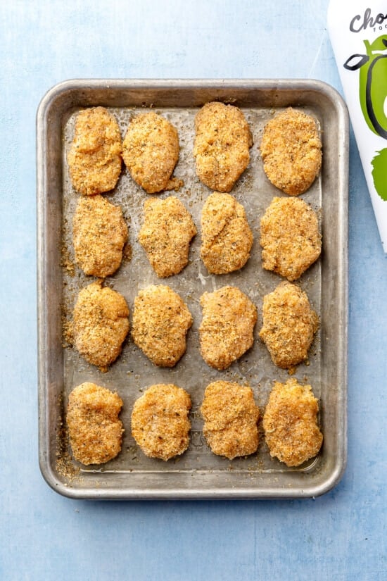 chicken nuggets on a baking sheet