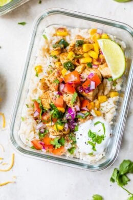 Chicken Taco Poblano Rice Bowls in a glass meal prep container.