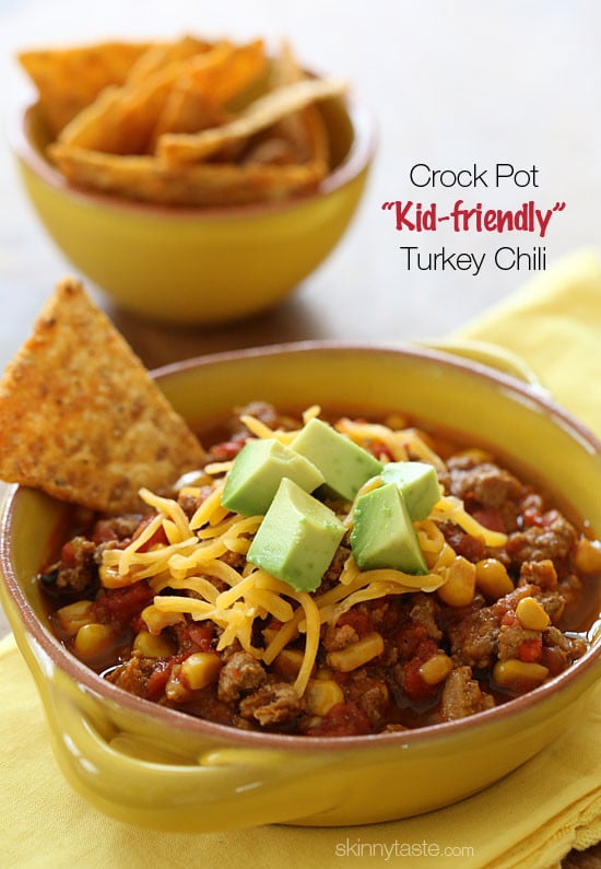 This CrockPot turkey chili recipe is just for the kiddos (or picky family members)! A kid-friendly chili with ground turkey, corn, bell pepper, tomatoes and spices. Serve it with some chips on the side for the perfect back to school lunch.