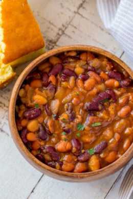 Instant Pot Baked Beans in bowl with cornbread