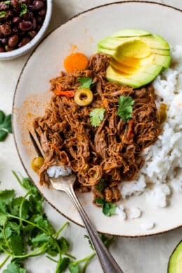 Ropa Vieja with rice and avocado