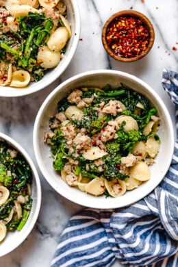 Orecchiette Pasta with Sausage and Broccoli Rabe uses chicken sausage in place of pork and a whole lot of garlic! This lightened up version will not disappoint!!