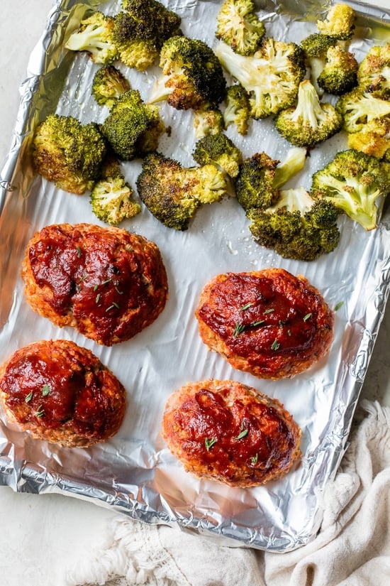 Sheet Pan Turkey Meatloaf and Broccoli made with individual loaves cooked on a foil-lined sheet pan for a quick meal with easy cleanup.